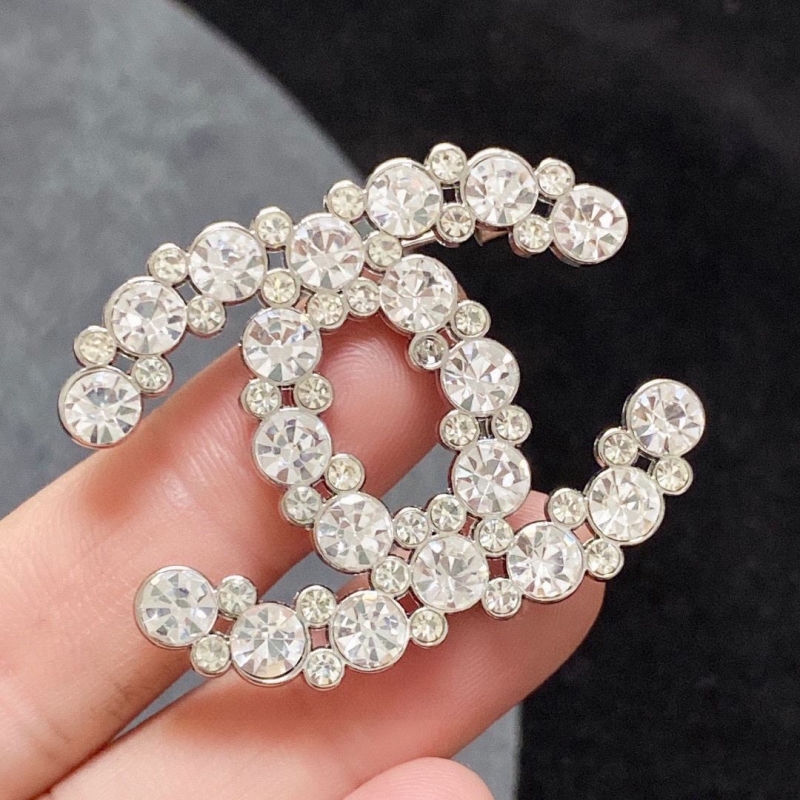 Ch**el brooches